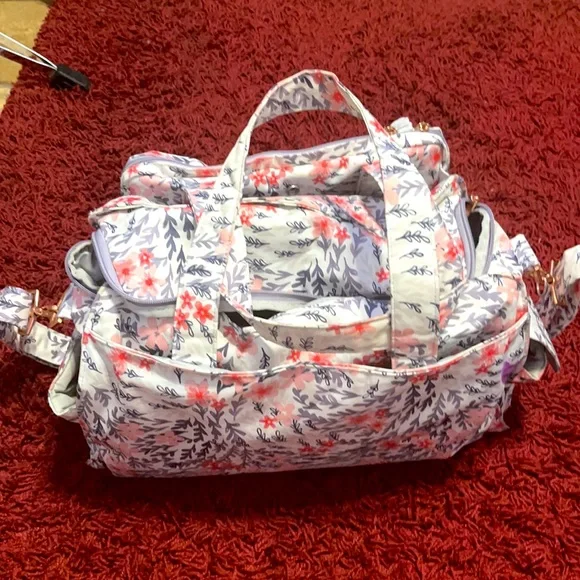 Ju-ju-be babybag, floral pattern typically for a girl.